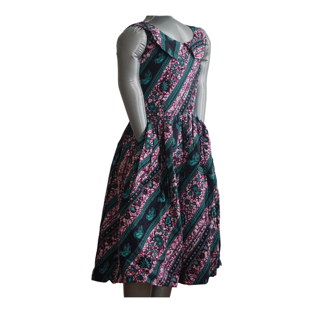 Ready to Wear Quality Ankara Dress with Extra Fabric for Adjustment. Size M